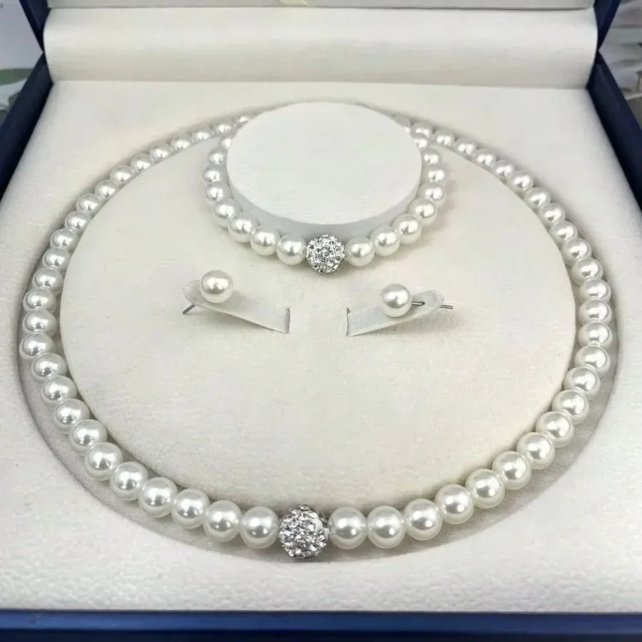 Elegant Pearl Fireball Jewelry Set – Necklace, Bracelet & Earrings