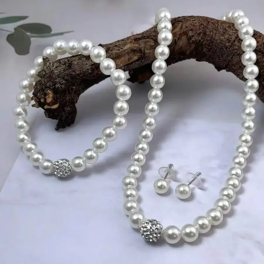 Elegant Pearl Fireball Jewelry Set – Necklace, Bracelet & Earrings