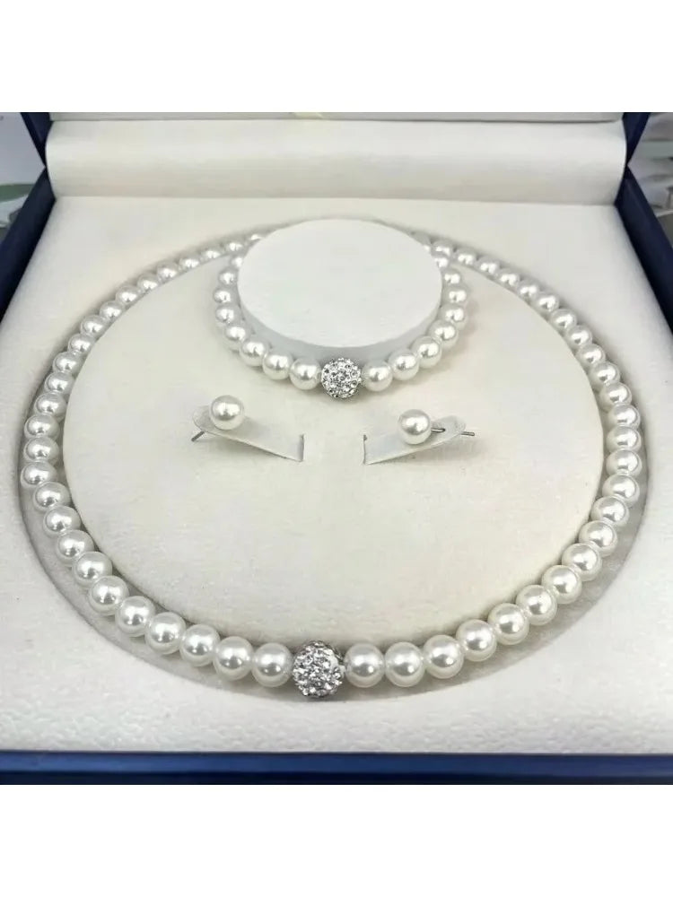 Elegant Pearl Fireball Jewelry Set – Necklace, Bracelet & Earrings